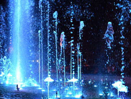Colorful musical fountain at night. Fountain of frozen splashes. Chelyabinsk, Russia, 05 September 2020.の写真素材