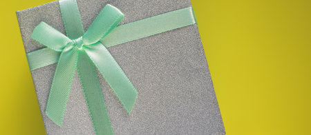 Gift box with a bow. Valentines day. Holiday gift. Copy space. Selective focus.の写真素材