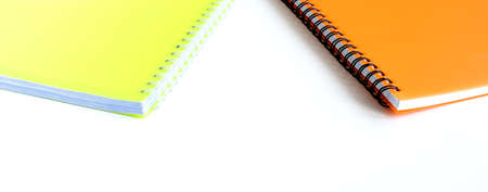 Bright school notebooks background isolated on white background. Back to school. Copy space. Selective focus. High quality photoの写真素材