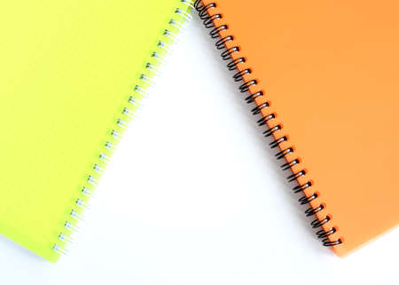 Bright school notebooks background isolated on white background. Back to school. Copy space. Selective focus. High quality photoの写真素材