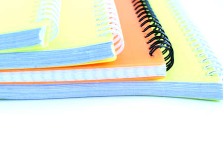 School notebooks with coil spring and color cover isolated on white background. Back to school....