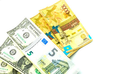 Banknotes of the USA, Europe and Kazakhstan isolated on a white background. Currency exchange...