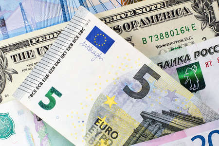 Euro banknotes, Russian rubles and US dollars. Money background.