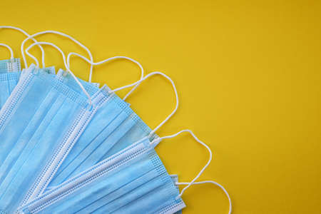 Three-layer surgical masks. Virus protection concept. selective focus.