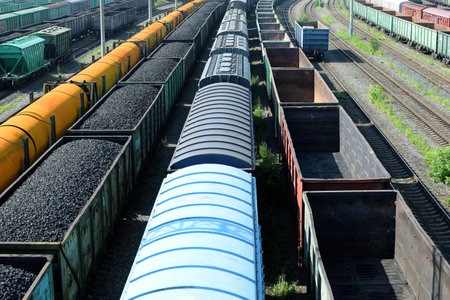 Russia, Chelyabinsk, July 08, 2022: Train loaded with coal departs from the railway station. Coal wagons. energy crisis concept.のeditorial素材