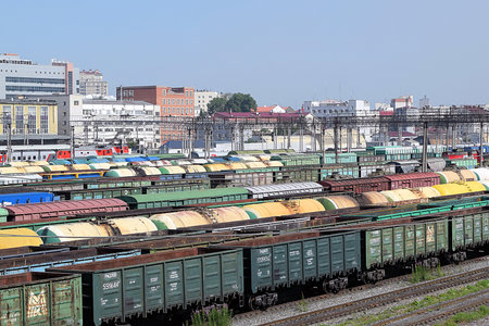 Russia, Chelyabinsk, July 08, 2022: Freight wagons with cargo at the railway station. Major...