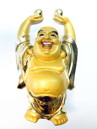 a gold statuette is a front view  on a white backgroundの写真素材