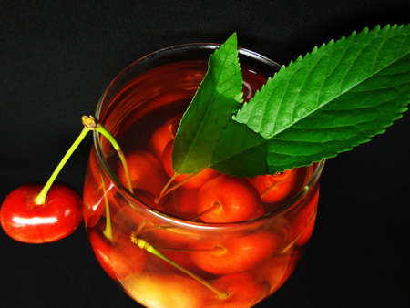 type  of cherry dessert on a black backgroundの写真素材