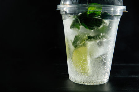 A cool non-alcoholic cocktail with mint and lime will help you refresh yourself in hot weather.