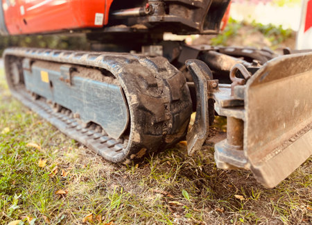 Hydraulic grab with cutter bar on waterfront of river.の写真素材