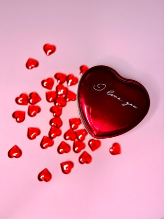Gift box for Valentine's Day on pink background.