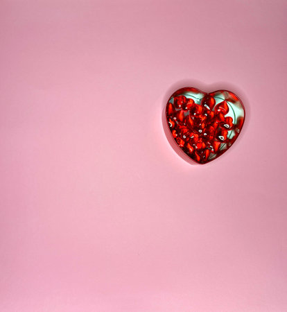 Gift box for Valentine's Day on pink background.