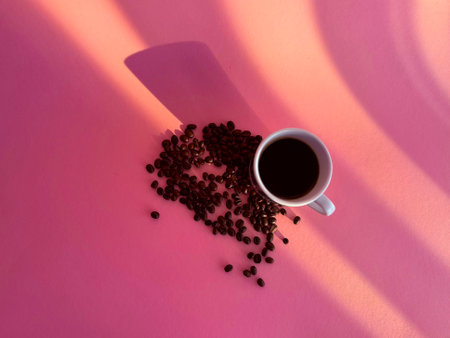 One coffee cup on pink background. Espresso drink. Copyspace. High quality photoの写真素材