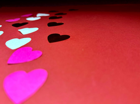 Valentine's day background with red hearts on pink background, flat lay. High quality photoの写真素材