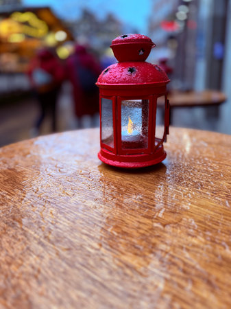 Lantern candle lamp, on wooden background. High quality photoの写真素材