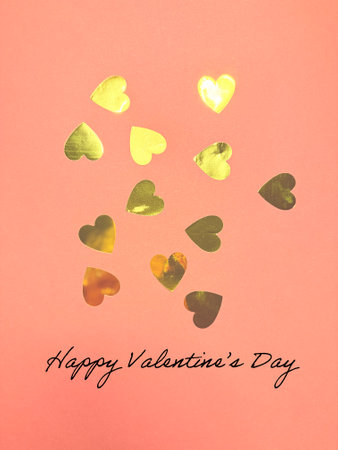 Valentine's Day concept. Top view photo of heart shaped candles and sprinkles on isolated light pink background with copyspace. High quality photoの写真素材