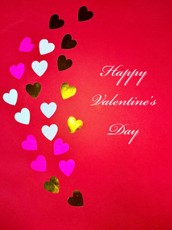 Valentine's day background with red hearts on pink background, flat lay. High quality photoの写真素材
