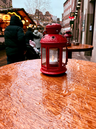 Lantern candle lamp, on wooden background. High quality photoの写真素材
