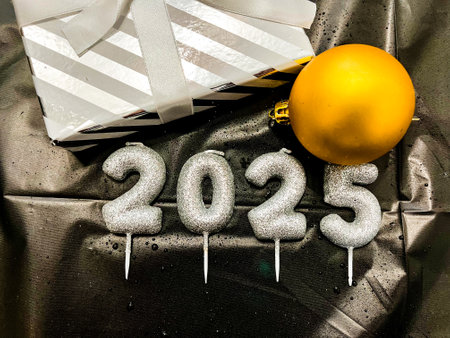 Happy New Year 2025. Gift boxes, balls, number 2025. New Years Eve celebration idea..
