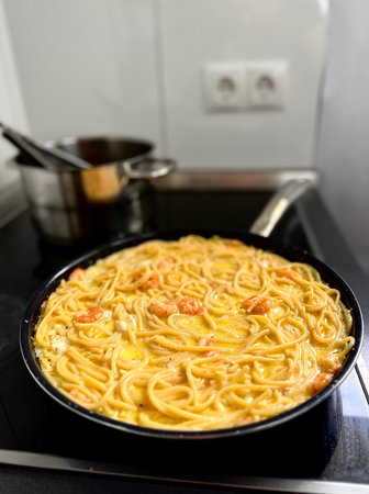 delicious spaghetti with shrimps, tomatoes, basil and cheese - Italian food style.の写真素材