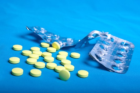 Handful of pills and packingの写真素材