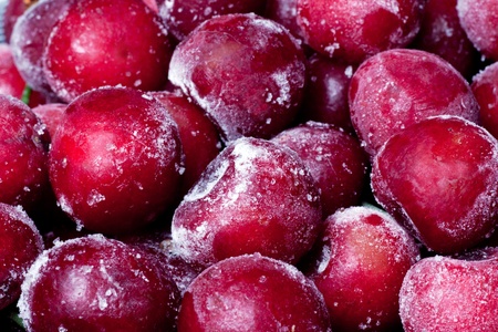 Ripe frozen sweet cherry close-up.の写真素材