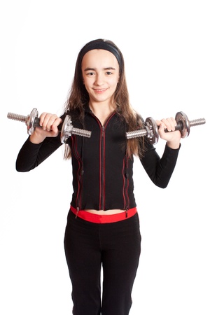 sports girl doing physical exercises with dumbbellsの写真素材