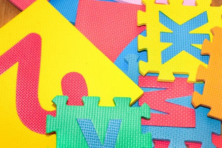 color parts of Puzzle are scattered on the floor