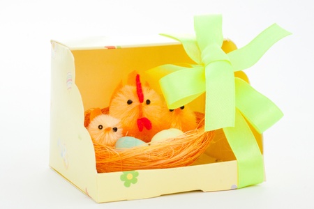 gift easter chickens and hen in a box with a bow