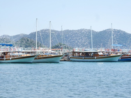 boats and yachts standing on the mooringの写真素材