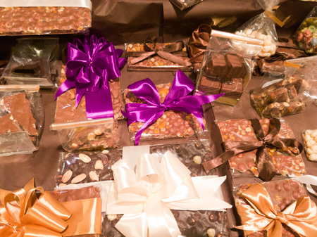 gift chocolate for every taste on the counter in the candy storeの写真素材