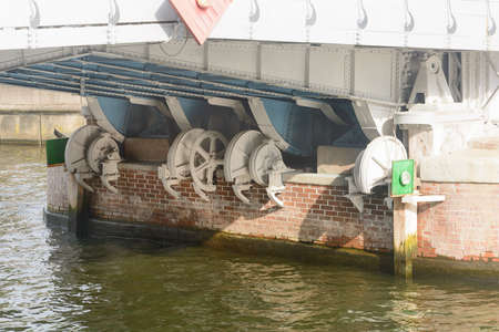 Mechanism of drawbridge across river. Bottom view of gears and lift structure.