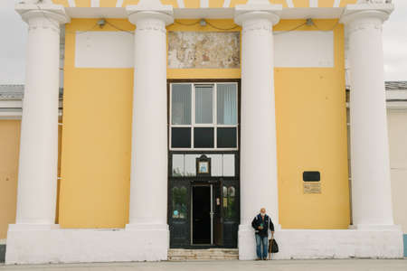 08/21/2021 Russia, Kolomna. A man asks for alms from the Russian Church of St. John the Theologian...