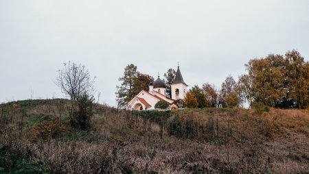 02.10.2021, Russia, Tula region, State Memorial Historical, Art and Natural Museum-Reserve of VD Polenov. Church of the Holy Trinity Life-Giving at Sunset in Autumn.のeditorial素材