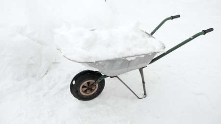 the cottage cart is filled with snow that can be taken awayの写真素材