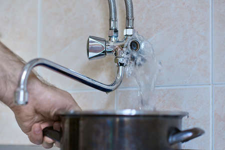 Kitchen chrome faucet is broken, horizontal view