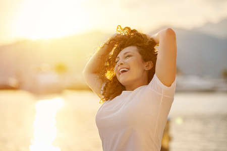 Red head Woman portrait on the beach