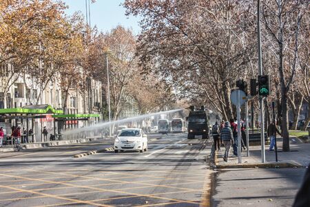 Santiago, Chile - June 23, 2011: Student's March, police used water cannon against the student protesters in Chile.のeditorial素材