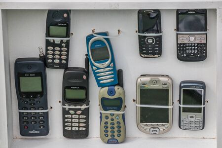 Auckland, New Zealand - April 09, 2017: A pile of old phone at Eco Day in New Lynn.のeditorial素材