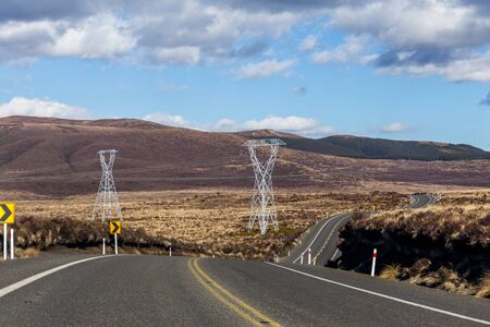 Electricity pylon in New Zealand road.