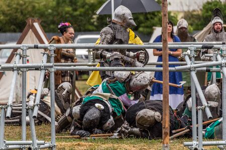 Levin, New Zealand - February 10, 2018: Reenactors battle at a medieval market in Levin showgrounds, New Zealand.のeditorial素材