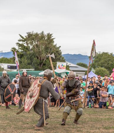 Levin, New Zealand - February 10, 2018: Reenactors battle at a medieval market in Levin showgrounds, New Zealand.のeditorial素材