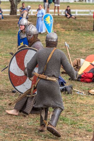 Levin, New Zealand - February 10, 2018: Reenactors battle at a medieval market in Levin showgrounds,...