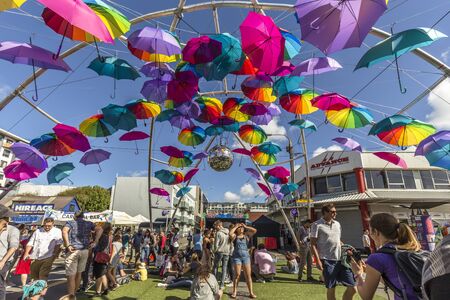 Wellington, New Zealand - March 25, 2018: People stroll under the umbrella installation on the intersection of Abel Smith and Cuba Street at Cuba Dupa 2018 in Wellington, New Zealand.のeditorial素材
