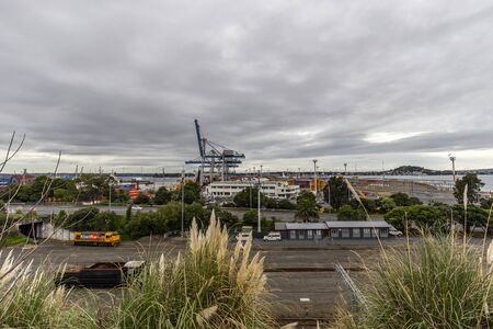 Auckland, New Zealand - June 09, 2018: View of Auckland commercial freight and cruise ship harbour facilities, domestic and international shipping services.のeditorial素材