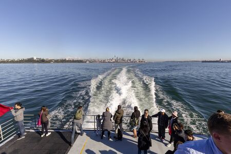 Auckland, New Zealand - June 09, 2018: Tourist on the roof of ferry boat direct from Auckland to...