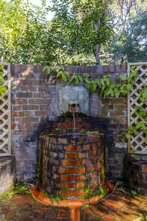 Wellington, New Zealand - July 14, 2018: Old Brick Fountain at Wellington Botanic Garden, New Zealand.のeditorial素材