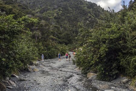 Aorangi Forest Park, New Zealand - March 03, 2018: Tourists on a trek in the Putangirua Pinnacles, New Zealandのeditorial素材