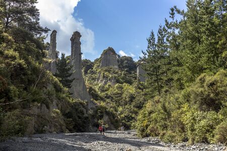 Aorangi Forest Park, New Zealand - March 03, 2018: Tourists on a trek in the Putangirua Pinnacles, New Zealandのeditorial素材