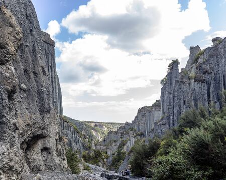 Aorangi Forest Park, New Zealand - March 03, 2018: Tourists on a trek in the Putangirua Pinnacles, New Zealandのeditorial素材
